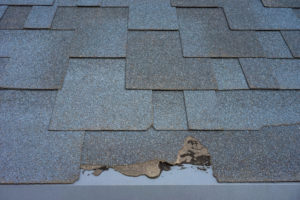 roof repair needed replace asphalt shingles